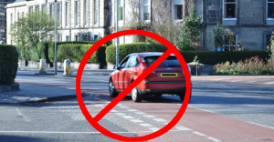 Car driving in the cycle lane